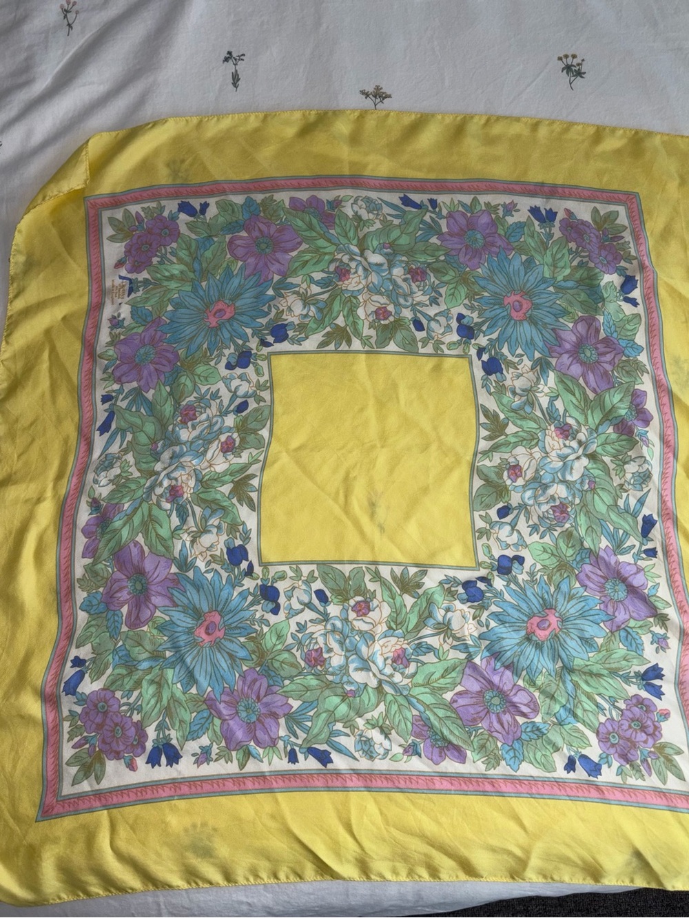 Liberty of London yellow-bordered floral silk scarf with purple and teal blooms